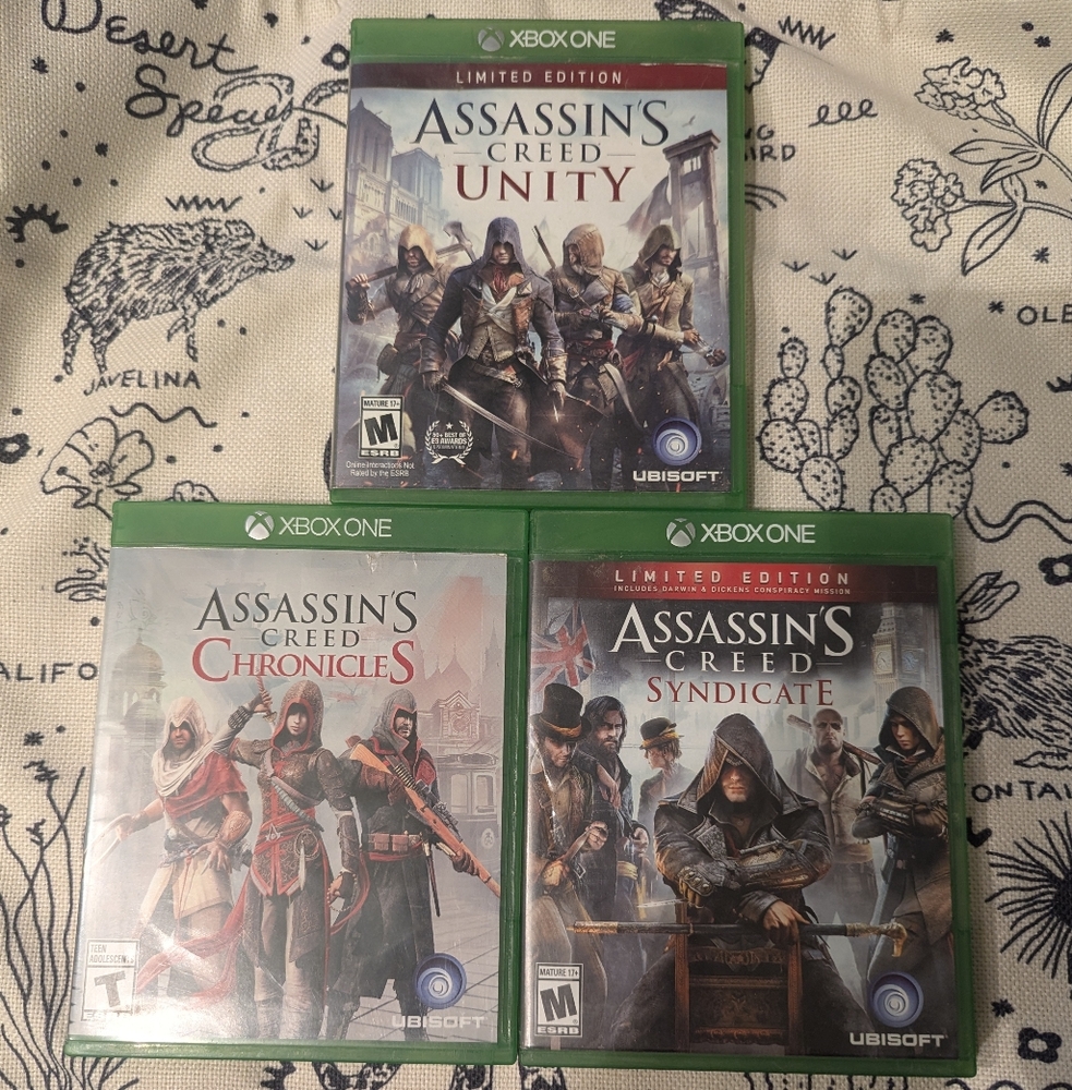 Assassin's creed bundle. All 3 games AC Unity, AC Syndicate, and AC Chronicles
